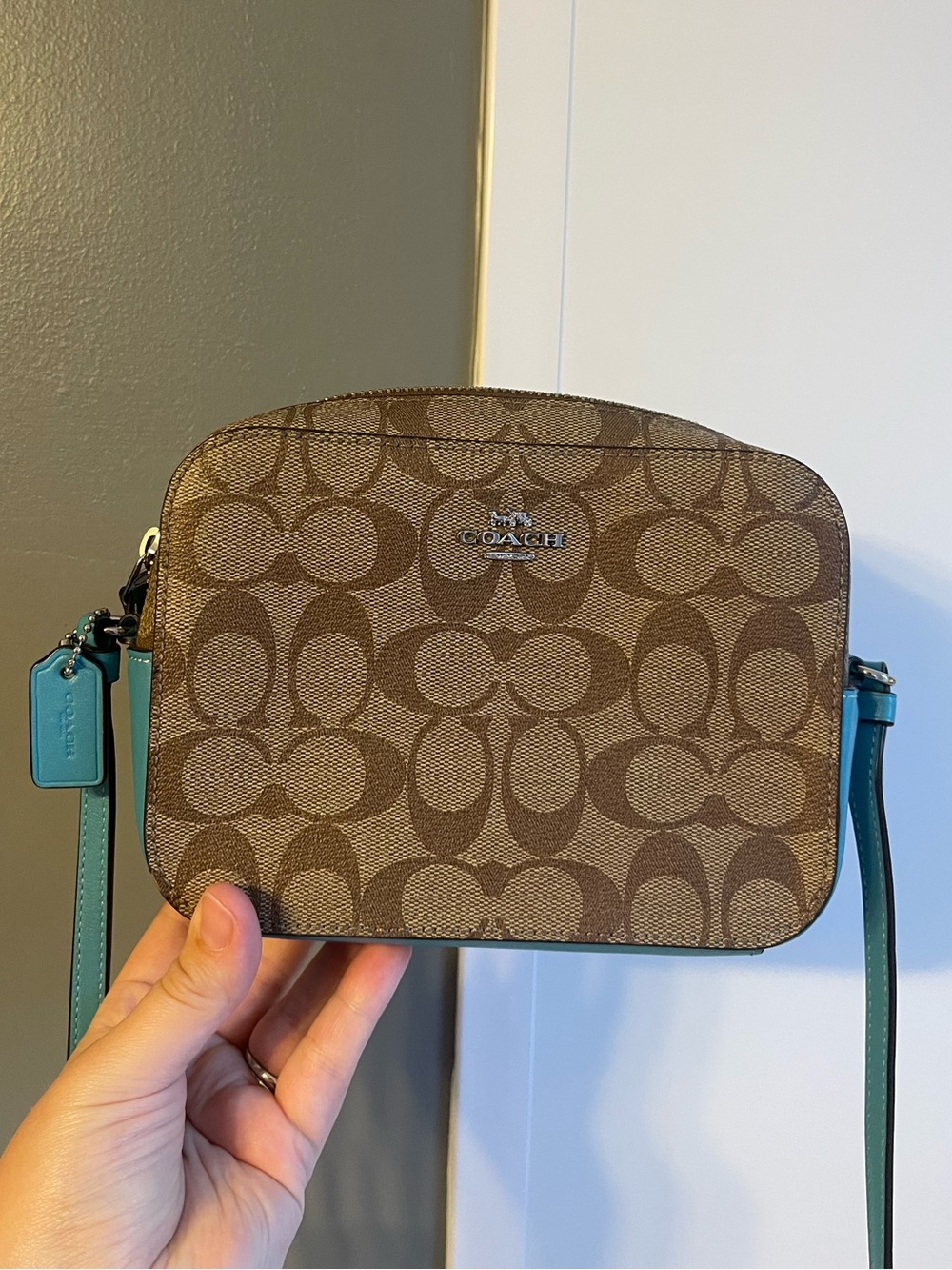 Signature coach Crossbody